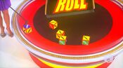 On his first roll, he has 4 cars and $1,500. He decides to roll again.