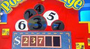 Tonia says the fourth number is a 4 but is incorrect. The car is now $1.00.