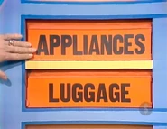 The next two prizes are luggage and appliances.