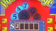 She says the second number is an 8 but is incorrect. The car is now 75¢.