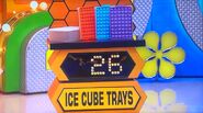 He bids $25 on the 4pc ice cube tray set. A difference of $1 . He picks card #1.