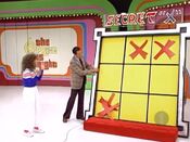 The "X" has fallen off the top left square. But nonetheless, she is a winner!