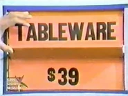 She keeps the tableware. The cosmetics are $39 and go into the Give column for a total of $74.