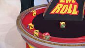 On her second roll, she has 3 cars and $500. She decides to roll again.