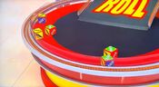 On his first roll, he has 2 cars and $3,000. He decides to roll again.