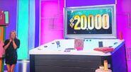 ...she wins a bonus of $20,000.