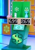 ...during Drew Carey's tenure the green dollar sign & asterisks get added.