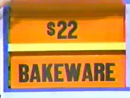 She keeps the bakeware. The toy is $22 and goes into the give column...
