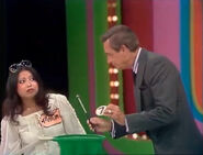 Mayumi's fifth draw is a 7. She thinks it's the first number.