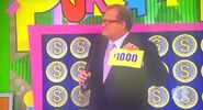 On his first punch, he has $1,000. He decides to throw it away.