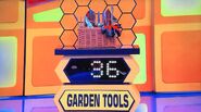 He bids $25 on the 8pc gardening tool set. A difference of $11. He gets no card.