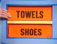 The first two prizes are shoes and towels.