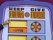 ...for a total of $117. She wins by $9!