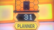 She bids $25 on the 256-page productivity planner. A difference of $6. She picks card #3.
