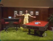 Janet is playing for a Murrey El Grande Billiard pool table and a Chromcraft bar set, a prize package worth $1,079.