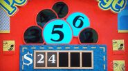 He says the third number is a 7 but is incorrect. The car is now $1.00.