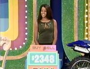 She buys the Yamaha TTR225 off-road motorcycle.