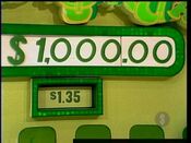 She decides to take the $1,000.