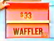 He keeps the waffler. The wallets are $33, and go into the give column for a total of $94.