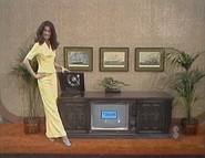 Sylvia is playing for a Teledyne-Packard Bell 25" color TV/stereo combination worth $950.