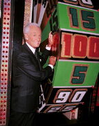 Bob Barker by the big wheel.