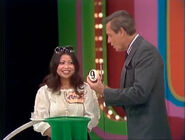 Mayumi's second draw is a 9. She thinks it's the second number.