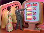 ...and goes into the keep column for a total of $51 thus far. If the wallets are $40 or more, she wins.