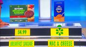 She says the Kraft Mac & Cheese original flavor macaroni & cheese is less expensive than the Beyond breakfast sausage spicy plant-based patties.