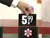 First, she picks the press-on nails which are $5.99.