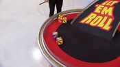 On his second roll, he has $2,000. He decides to roll again.