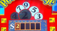 She says the second number is a 4 but is incorrect. The car is now 50¢.