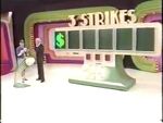 Five-digit 3 Strikes in 1995 (this time without the "+"). Note the window with the dollar sign, and the baseball-shaped bag that holds the chips.