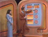 ...for a total of $217. She keeps the shower, the slacks, and the wallets no matter what happens But if they total $217 or more, she wins.