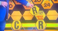 It's another R. $1,000 is still up for grabs, but the contestant decides to go for the car.