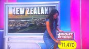 She picks the trip to Auckland, New Zealand.