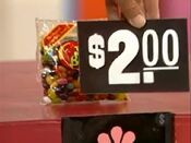 Third, she picks the Jelly Belly assorted jelly beans.