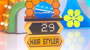 He bids $120 on the Conair flat iron. A difference of $91. He gets no card.