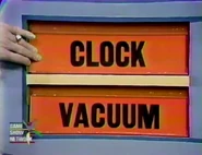 The first two prizes are a clock and a vacuum.