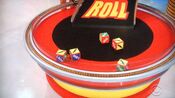 On his first roll, he has 4 cars and $1,000. He decides to roll again.