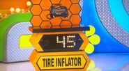 She bids $80 on the AstroAI tire inflator. A difference of $35. She gets no card.