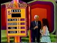 Which two prizes total $2498?