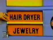 The first two prizes are jewelry and a hair dryer.