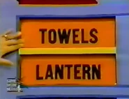 The last two prizes are a lantern and towels.