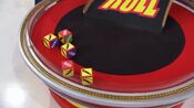 On his first roll, he has 3 cars and $1,000. He decides to roll again.