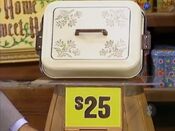 The price of the cake carrier is $25.