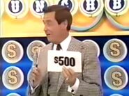 On her second punch, she has $500. She decides to throw it away.
