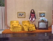 ...a pair of Stratolounger recliners and a 23" color TV from the Spiegel catalog, a prize package worth $1,058.