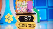 He bids $39 on the 10pc gardening tool set. He picks card #2.