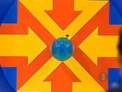 Bob's inspiration throw went just over the balloon.