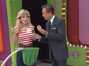 Her third draw is an 8. She thinks it's the third number.